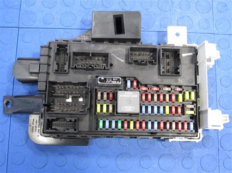 2010 mustang smart junction box location|Where is the Smart Power Distribution Junction Box located.